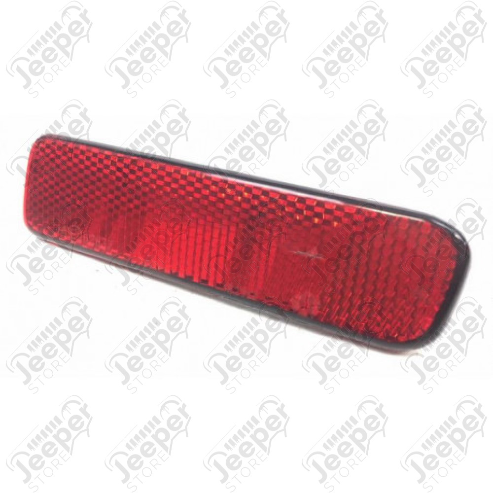 Catadioptre gauche sur pare chocs arrière Jeep Grand Cherokee WJ, WG