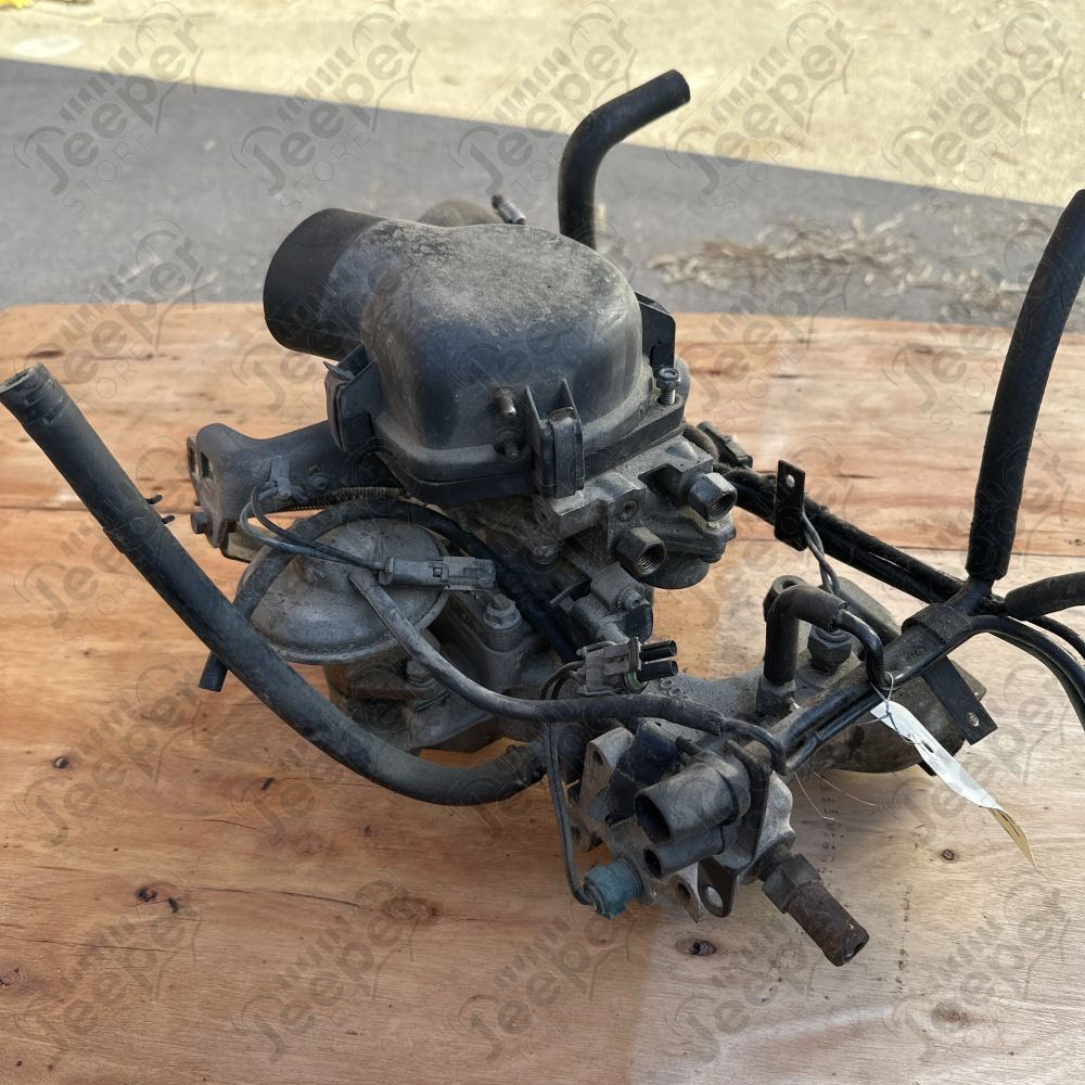 Occasion : Collecteur d’admission complète avec boîtier papillon d’injection 2.5L mono point pour YJ, XJ (1987-1991)