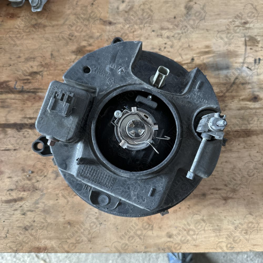 Occasion : Phare avant gauche (conduite anglaise) pour Jeep Cherokee Liberty KJ (2002-2004)