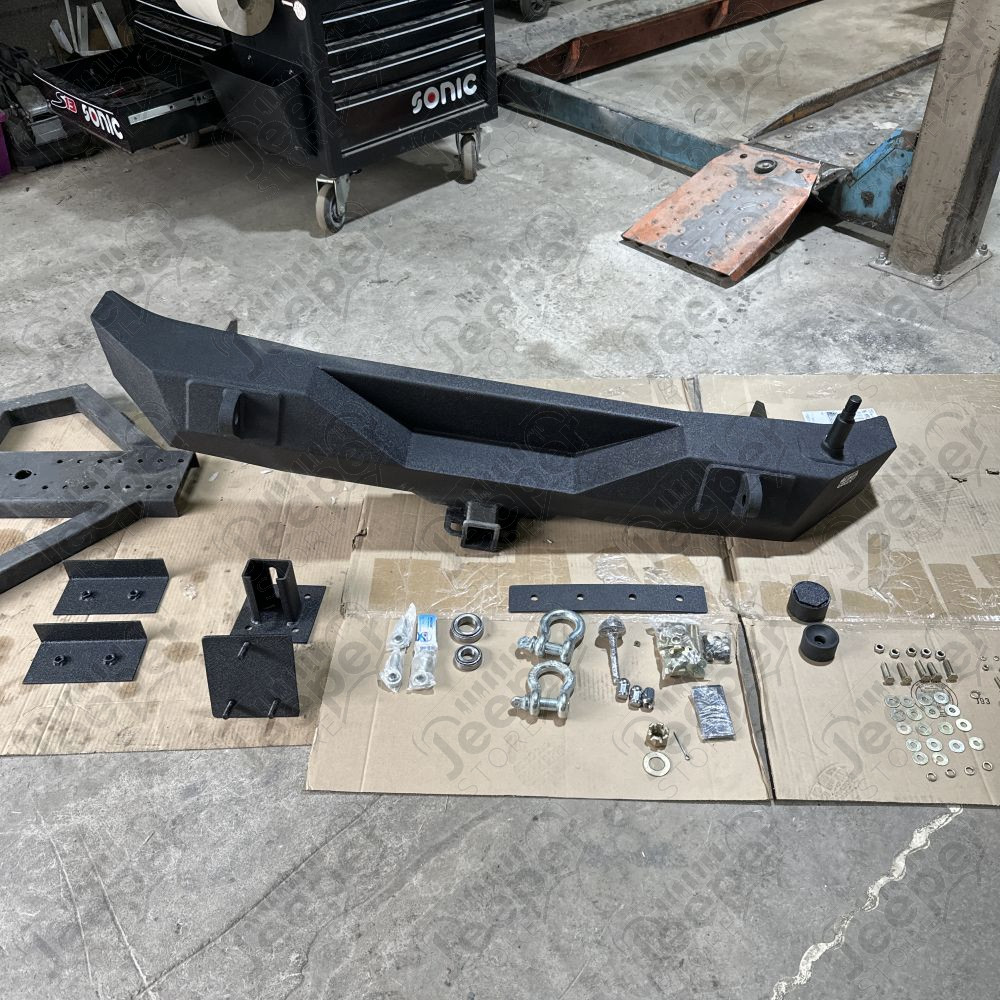 Occasion : Pare chocs arrière avec porte roue de secours (incomplet) pour Jeep Wrangler JK (2007-2018)
