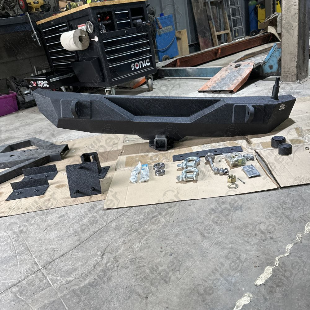 Occasion : Pare chocs arrière avec porte roue de secours (incomplet) pour Jeep Wrangler JK (2007-2018)