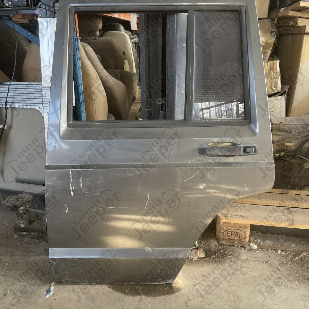 Occasion : Porte arrière gauche grise pour Jeep Cherokee XJ (1984-1996)