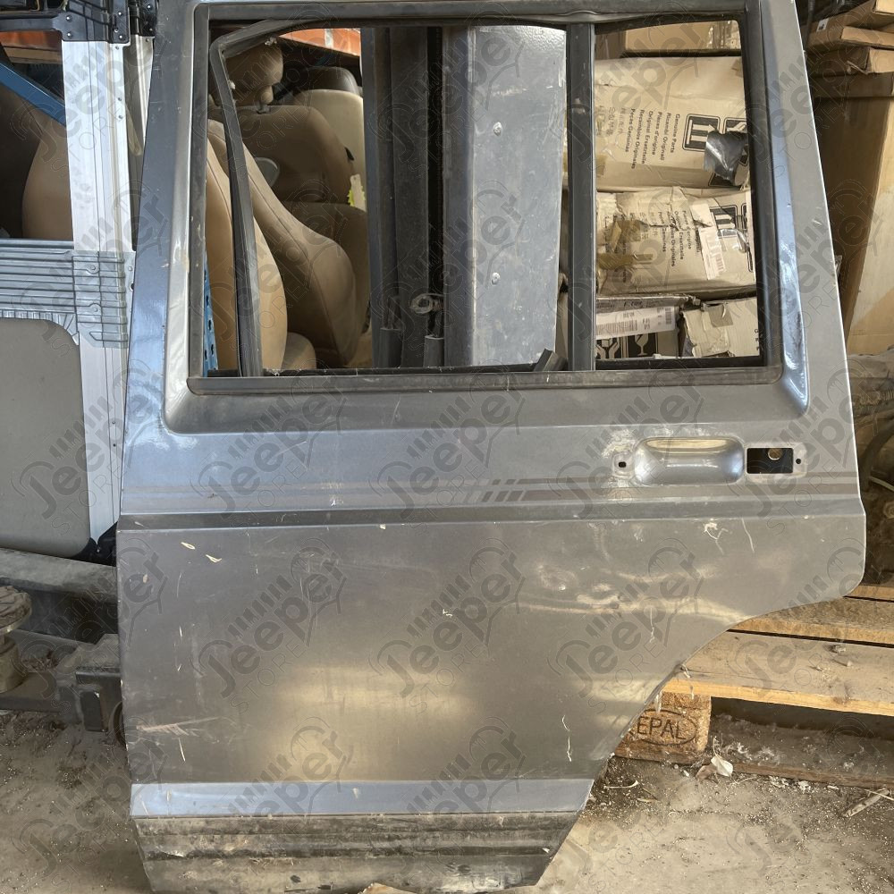 Occasion : Porte arrière gauche grise pour Jeep Cherokee XJ (1984-1996)