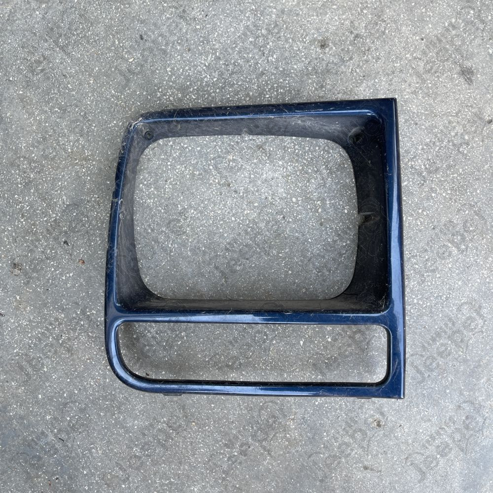 Occasion : Enjoliveur de phare avant droit pour Jeep Cherokee XJ (1997-2001)