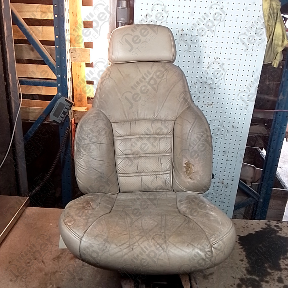 Occasion : Siège conducteur beige en cuir (sans son socle) + appui tête pour Jeep Cherokee XJ