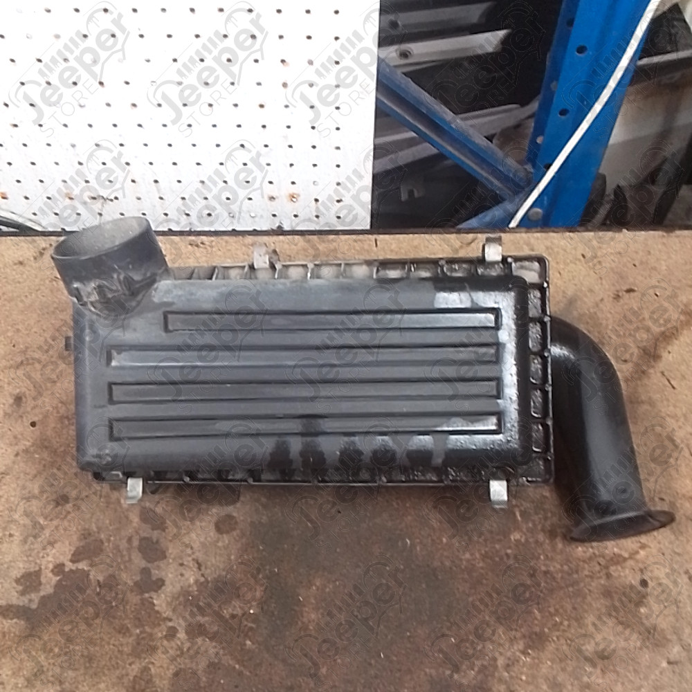 Occasion : Boîte à air pour 4.0L essence (dessous cassé) pour Jeep Cherokee XJ