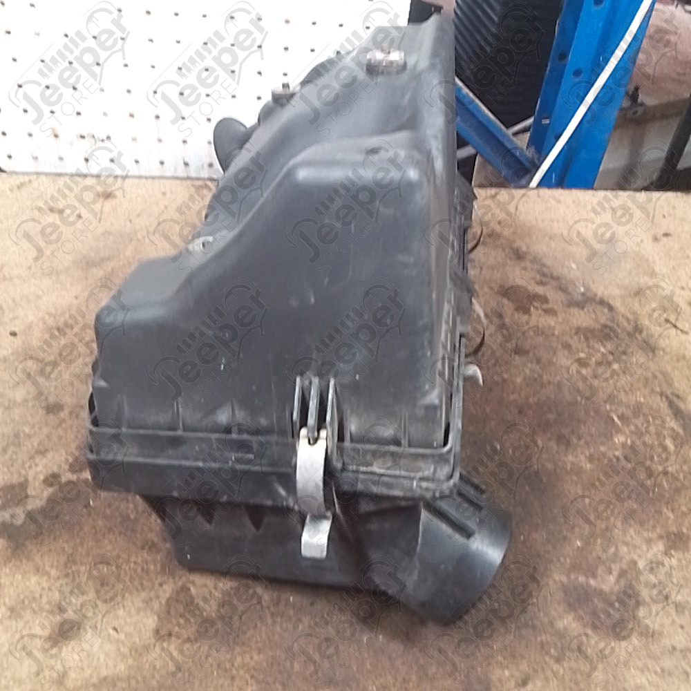Occasion : Boîte à air pour 4.0L essence (dessous cassé) pour Jeep Cherokee XJ