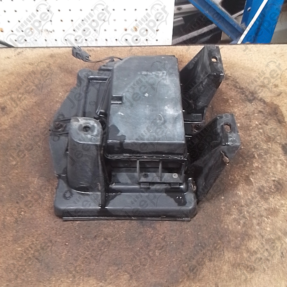 Occasion : Support de batterie avec réservoir d'air de régulateur de vitesses. pour Jeep Wrangler TJ