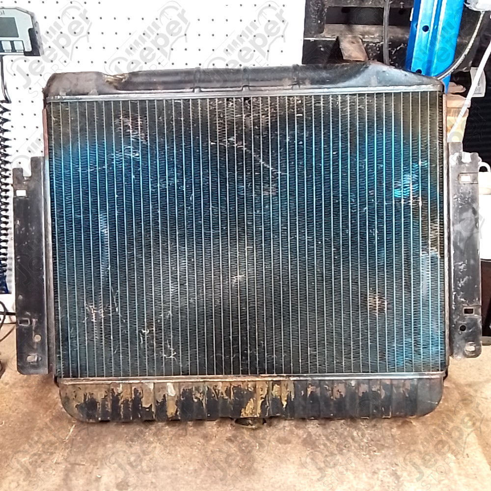 Occasion : Radiateur moteur avec sa buse d'air/ longueur fixation : 74 cm / hauteur : 14,5 cm / largeur : 62 cm pour Jeep divers