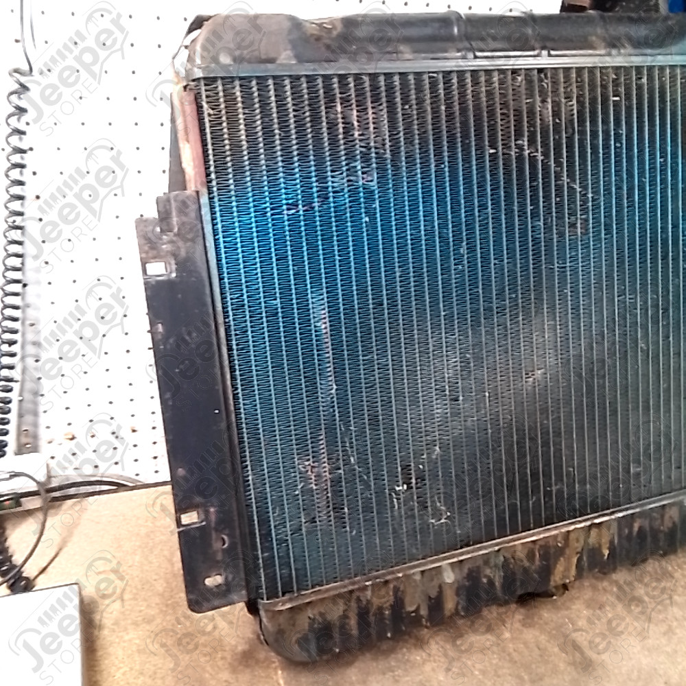Occasion : Radiateur moteur avec sa buse d'air/ longueur fixation : 74 cm / hauteur : 14,5 cm / largeur : 62 cm pour Jeep divers