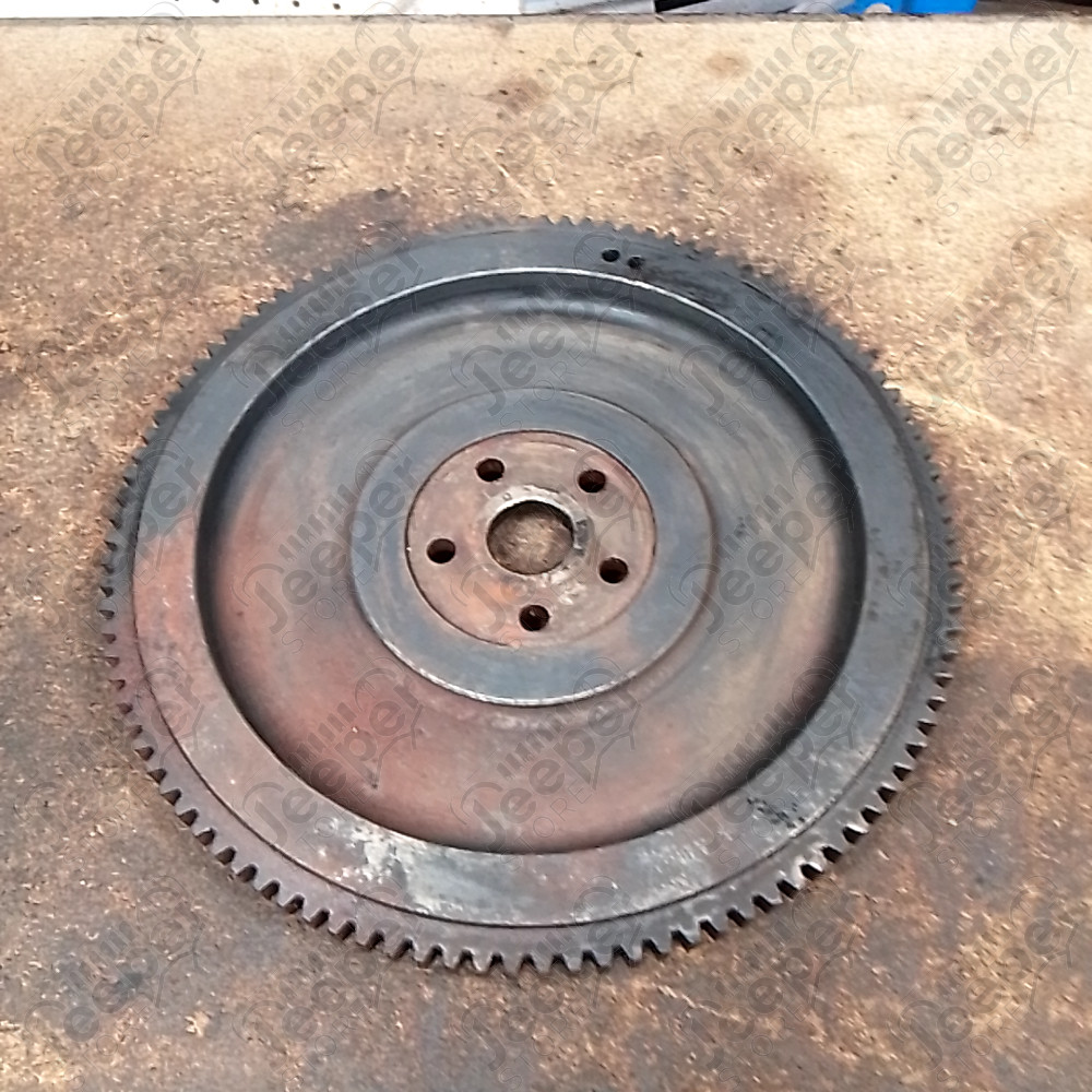 Occasion : Volant moteur / dents : 104 dents / diamètre : 33,5 cm / profondeur : 4 cm pour Jeep divers