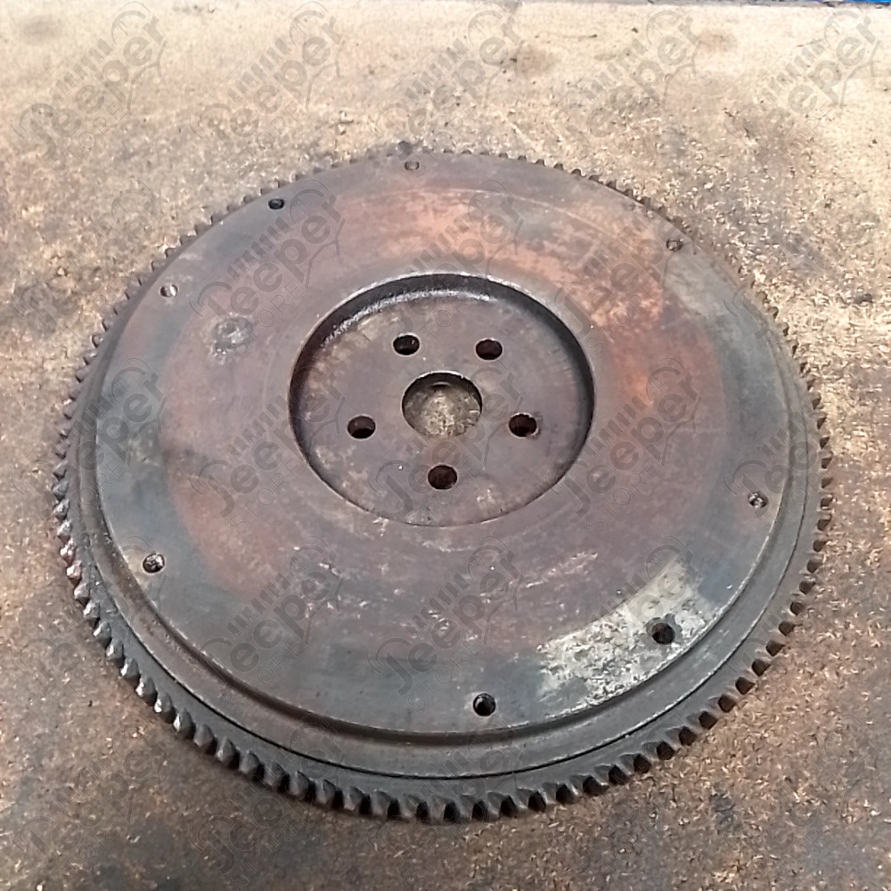 Occasion : Volant moteur / dents : 104 dents / diamètre : 33,5 cm / profondeur : 4 cm pour Jeep divers