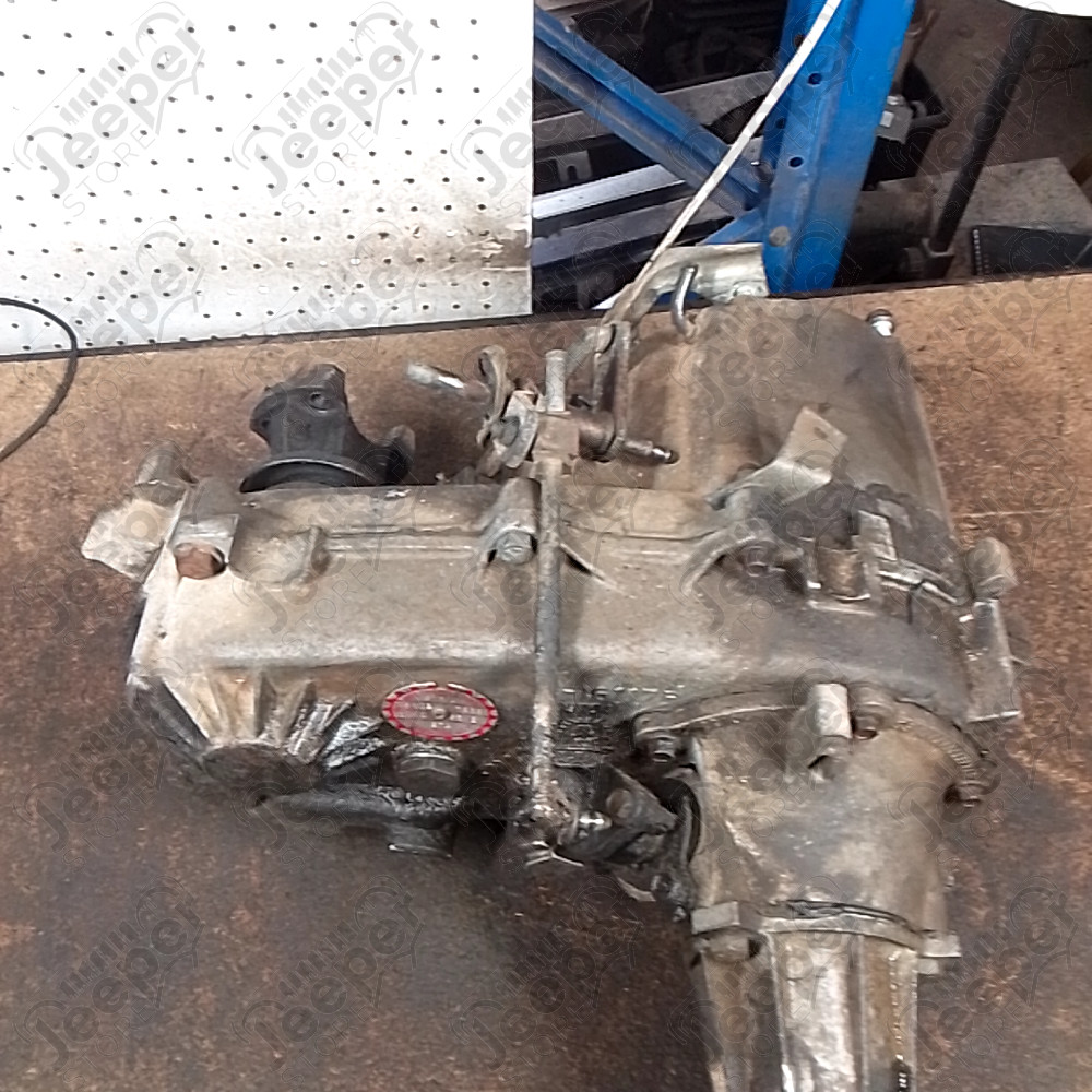 Occasion : Boîte de transfert NP231 2.5L essence / ratio : 2,72 / nombre de dents : 21 (non testée) pour Jeep Cherokee XJ