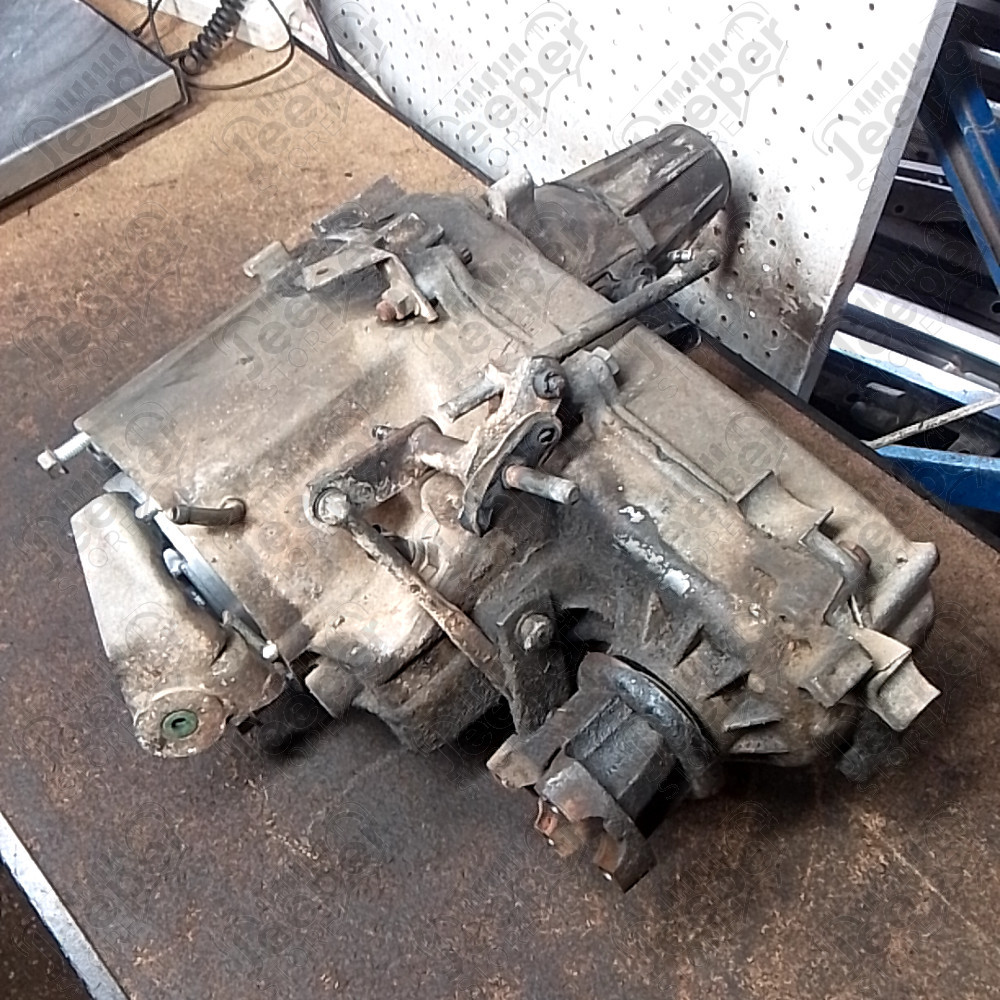 Occasion : Boîte de transfert NP231 2.5L essence / ratio : 2,72 / nombre de dents : 21 (non testée) pour Jeep Cherokee XJ