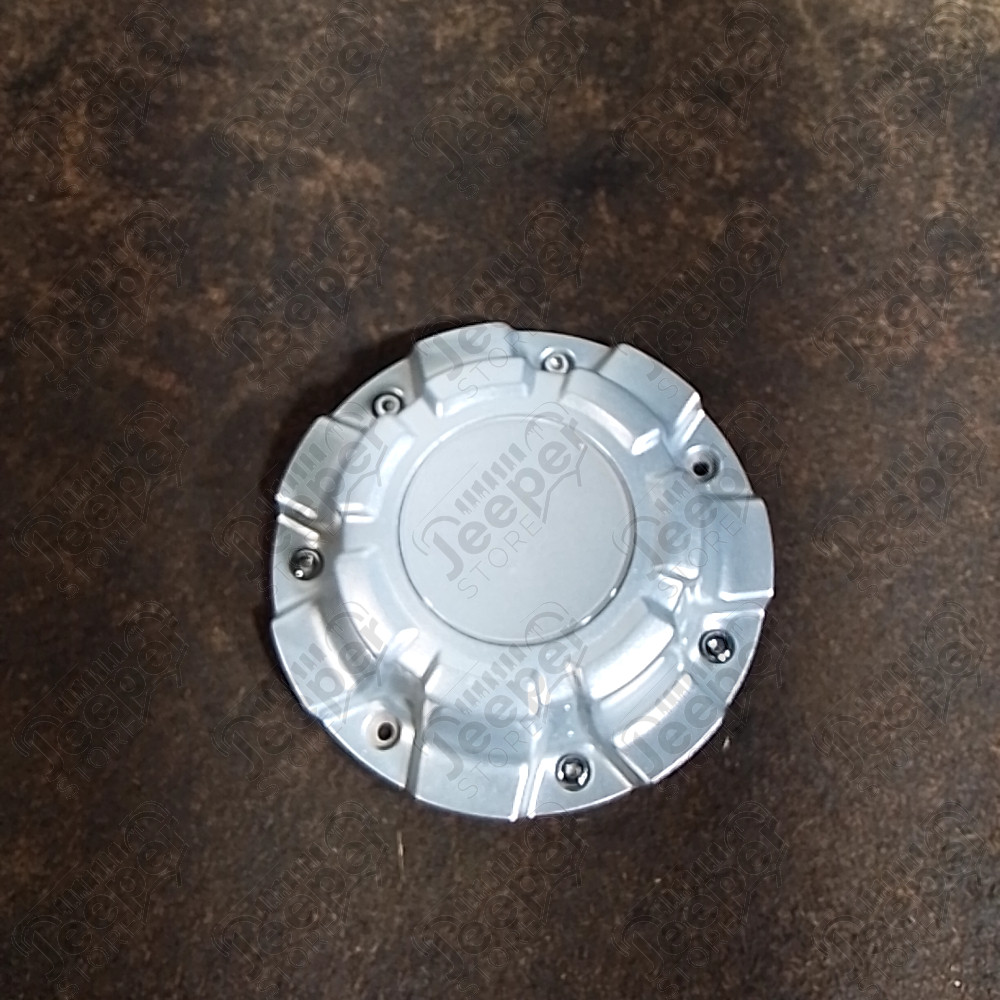 Occasion : Cache moyeu gris en plastique pour Jeep Wrangler JK
