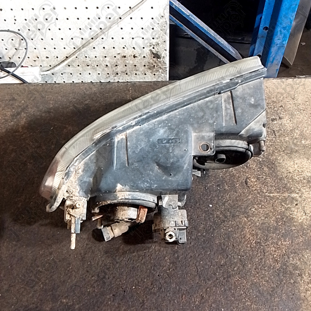 Occasion : Phare avant gauche version Europe pour Jeep Grand Cherokee WJ, WG