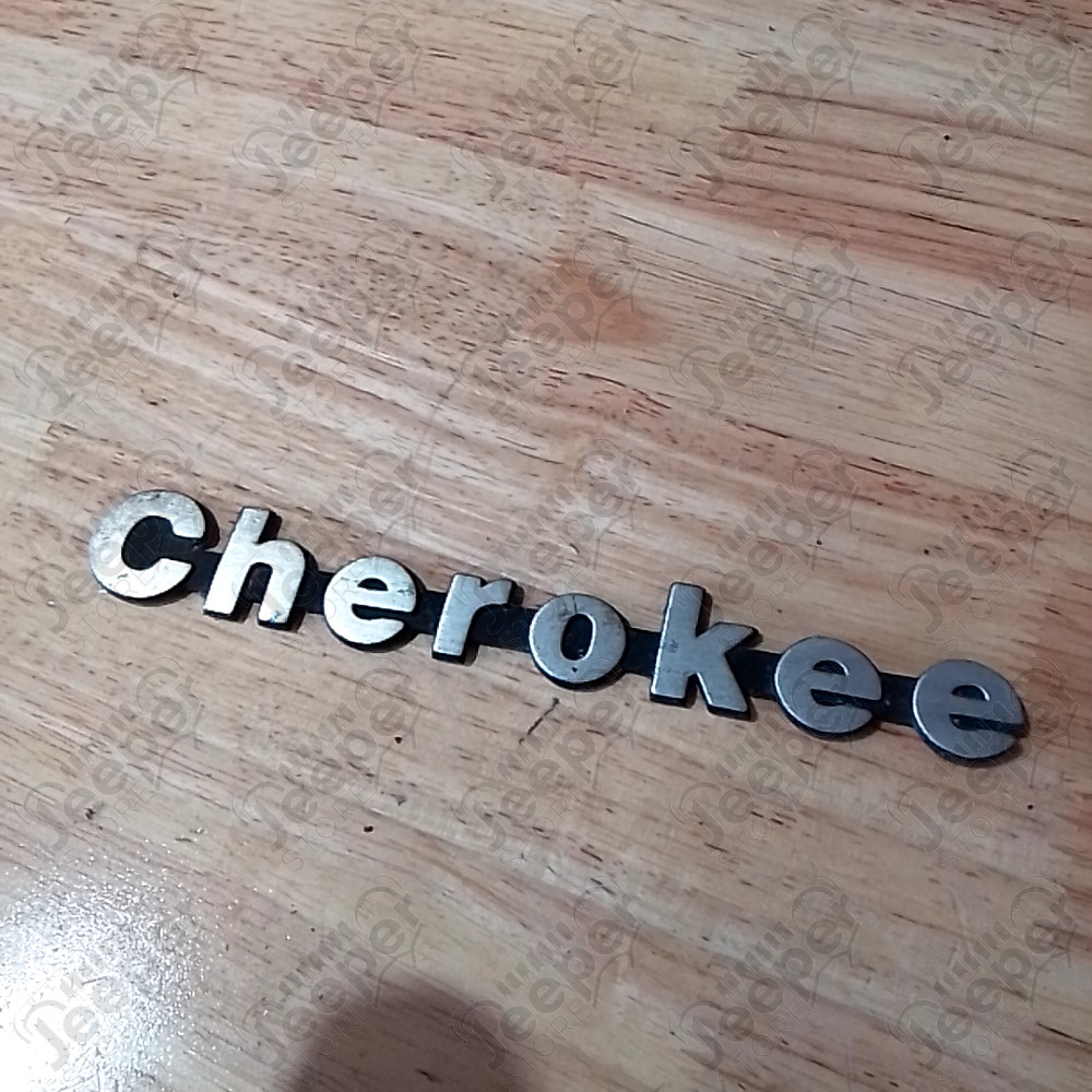 Occasion : Emblème logo "Cherokee" pour Jeep Cherokee XJ