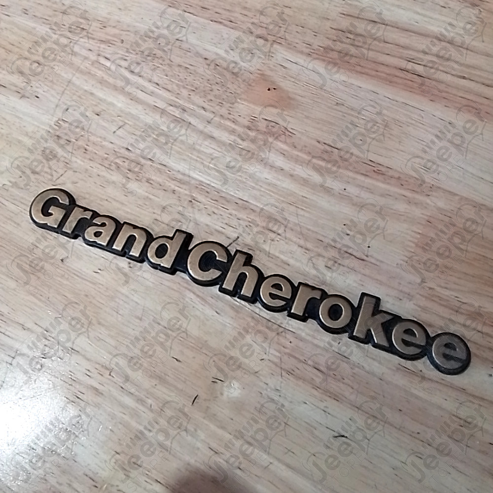 Occasion : Emblème logo "Grand Cherokee" pour Jeep Grand Cherokee ZJ, ZG