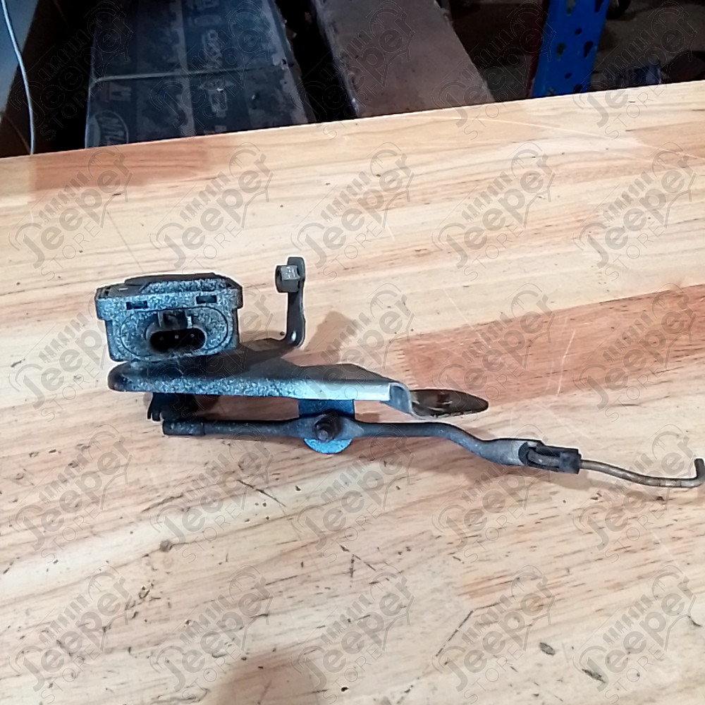 Occasion : Cuvelage pour phare avant gauche avec réglage électrique pour Jeep Cherokee XJ