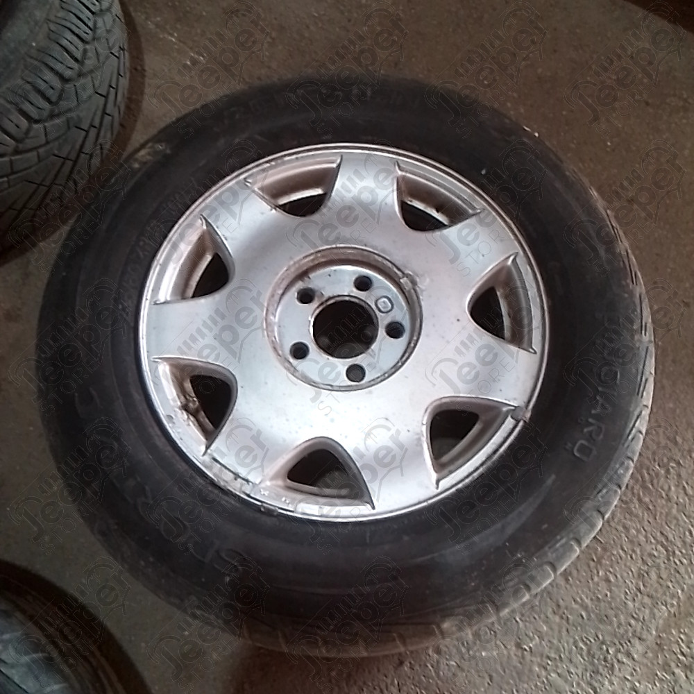 Occasion : Lot de 4 roues (jante d'origine) + 2 pneus VREDESTEIN et 2 pneus GENERAL en 235/60ZR16 pour Cadillac Seville STS 4.6L V8 - 32 soupapes - 4 portes - Boite automatique 4 rapports