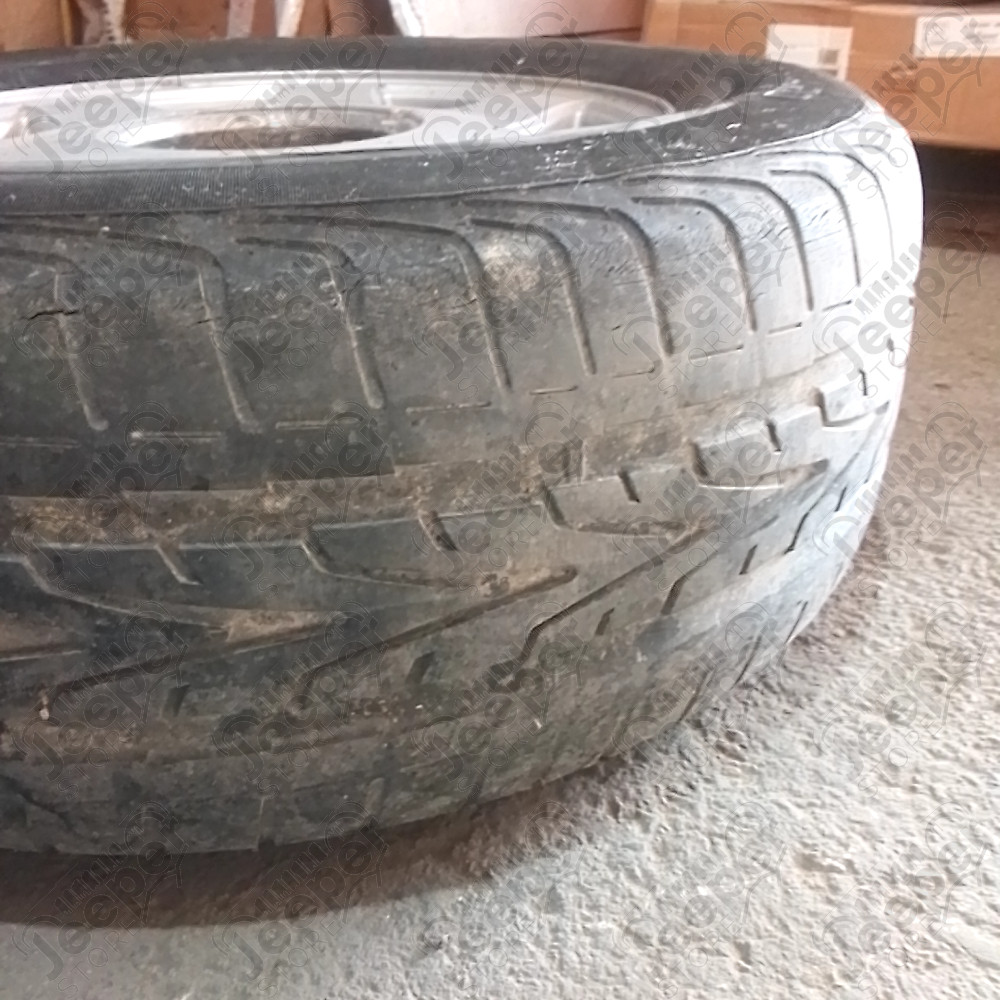 Occasion : Lot de 4 roues (jante d'origine) + 2 pneus VREDESTEIN et 2 pneus GENERAL en 235/60ZR16 pour Cadillac Seville STS 4.6L V8 - 32 soupapes - 4 portes - Boite automatique 4 rapports