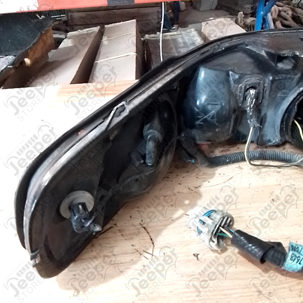 Occasion : Phare avant gauche (endommagé) pour Cadillac Seville STS 4.6L V8 - 32 soupapes - 4 portes - Boite automatique 4 rapports