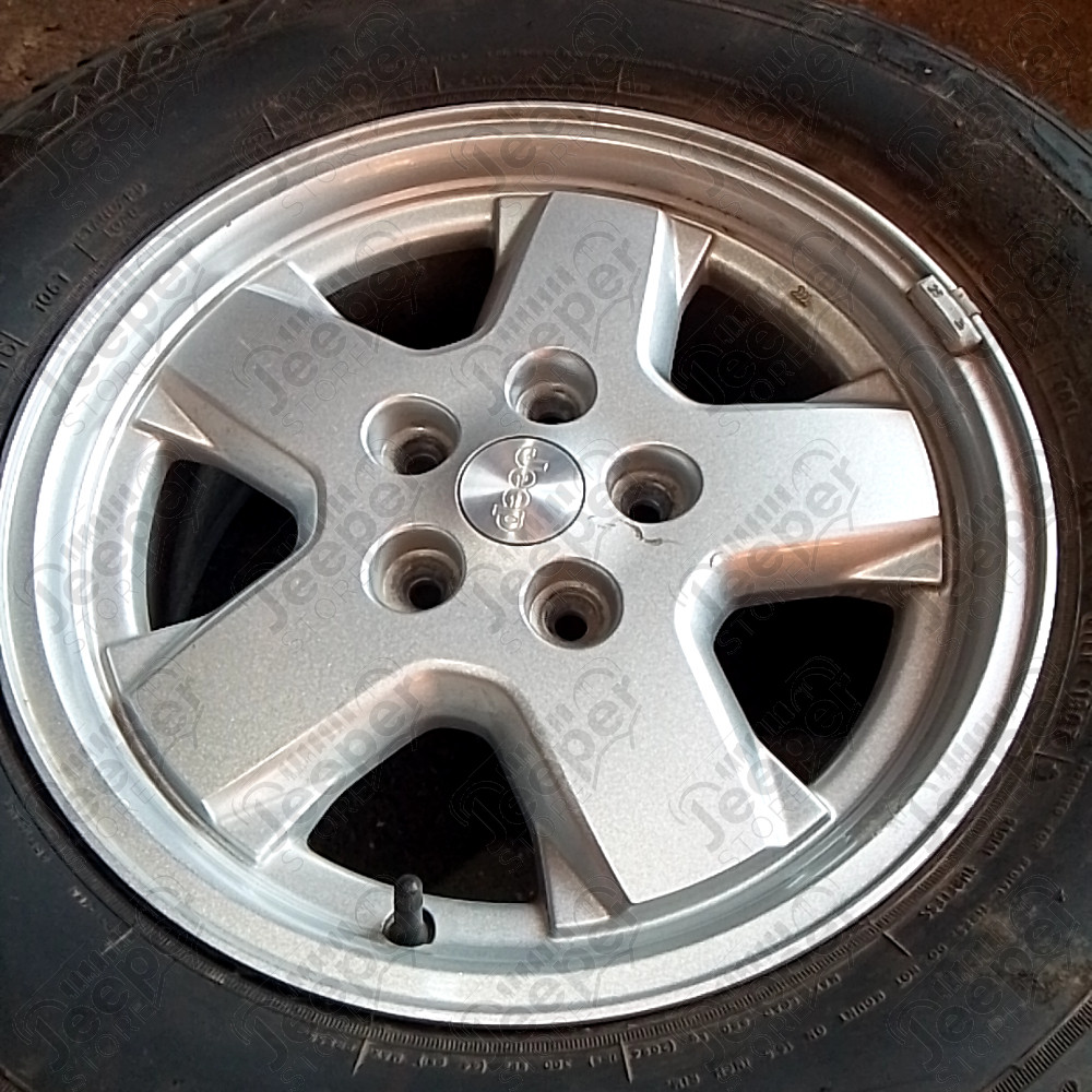 Occasion : Roue avec jante alu d'origine + pneu GOODYEAR Wrangler S4 en 235/70R16 pour Jeep TJ, XJ, ZJ, ZG