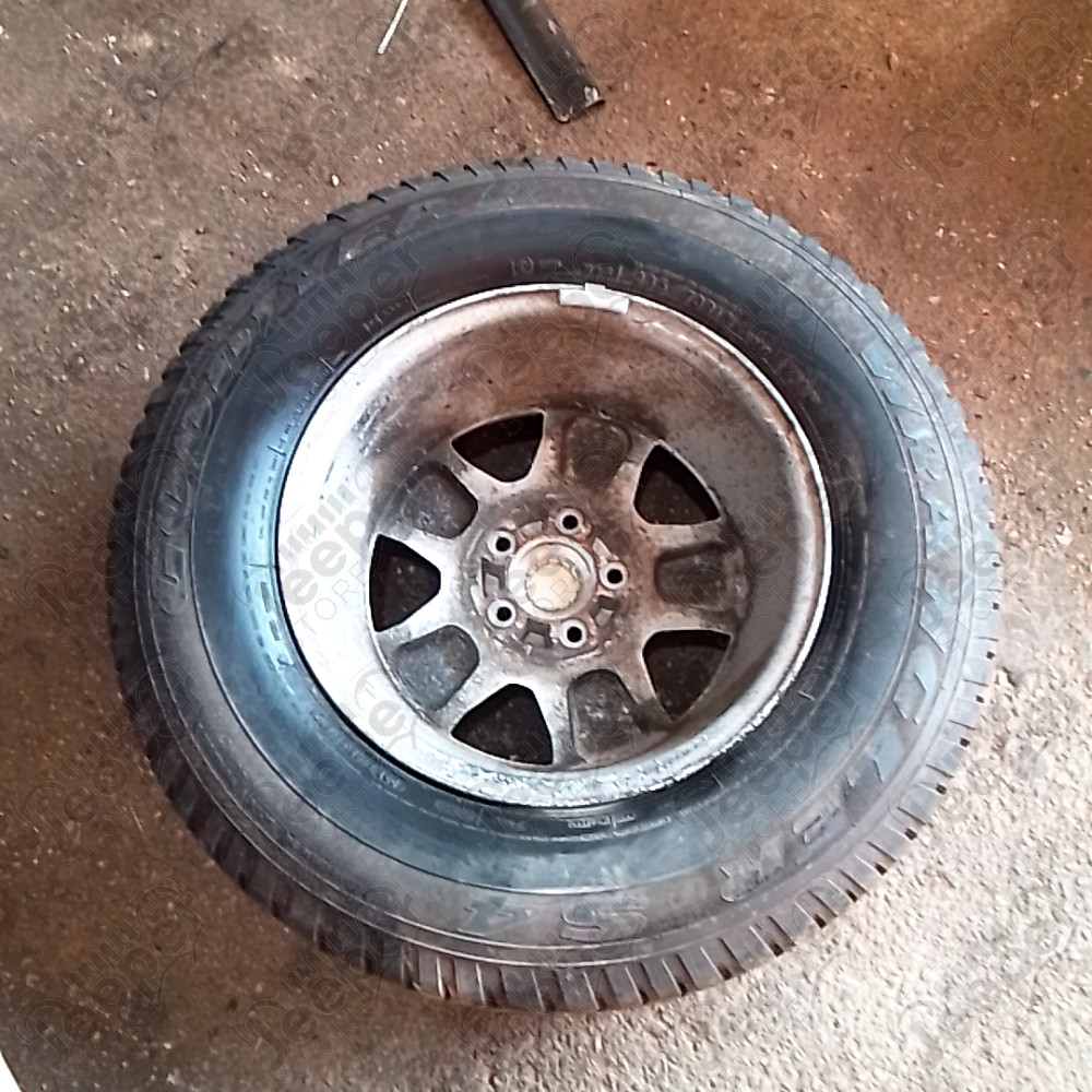 Occasion : Roue avec jante alu d'origine + pneu GOODYEAR Wrangler S4 en 235/70R16 pour Jeep TJ, XJ, ZJ, ZG
