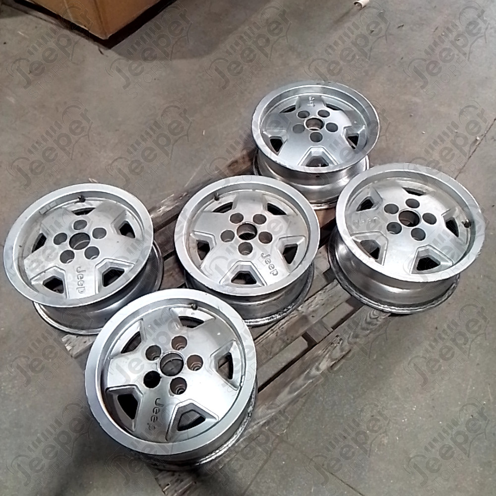 Occasion : Jante en aluminium d'origine 5x114.3 - 7x15 pour Jeep YJ, XJ, ZJ, ZG