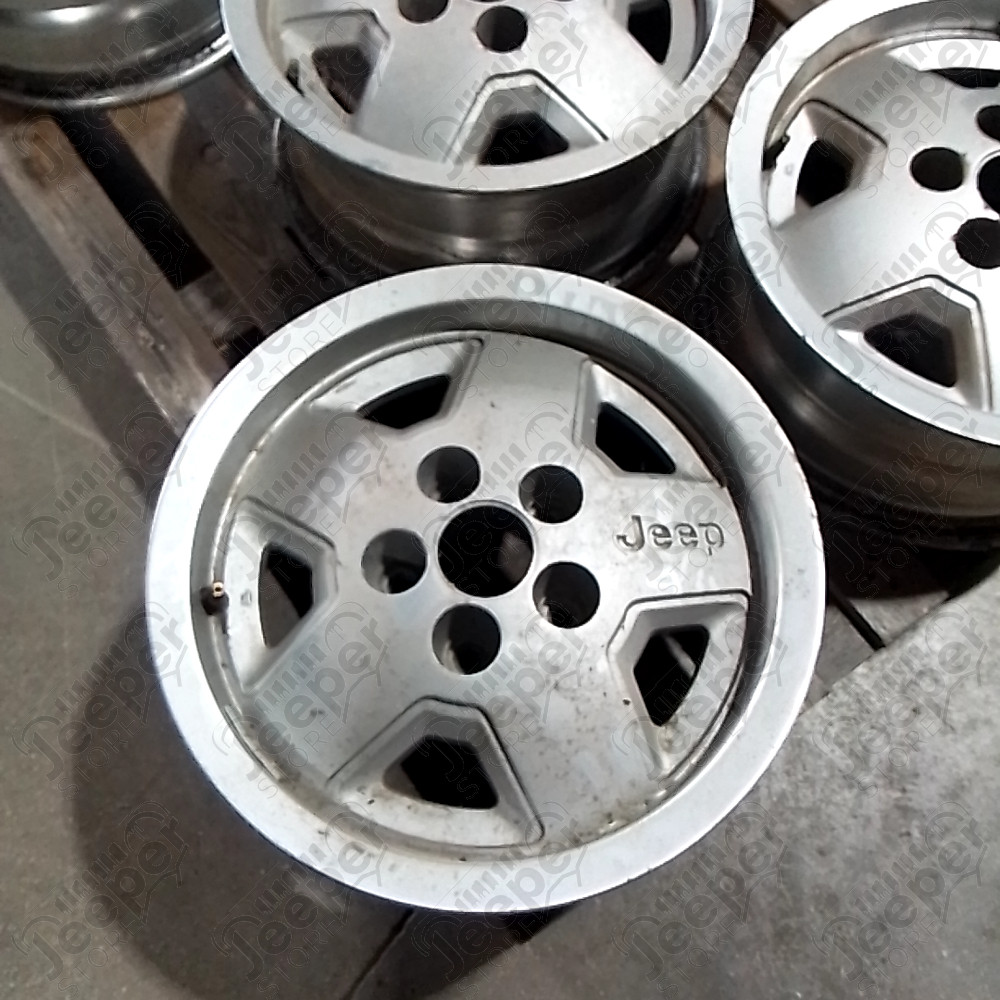 Occasion : Jante en aluminium d'origine 5x114.3 - 7x15 pour Jeep YJ, XJ, ZJ, ZG
