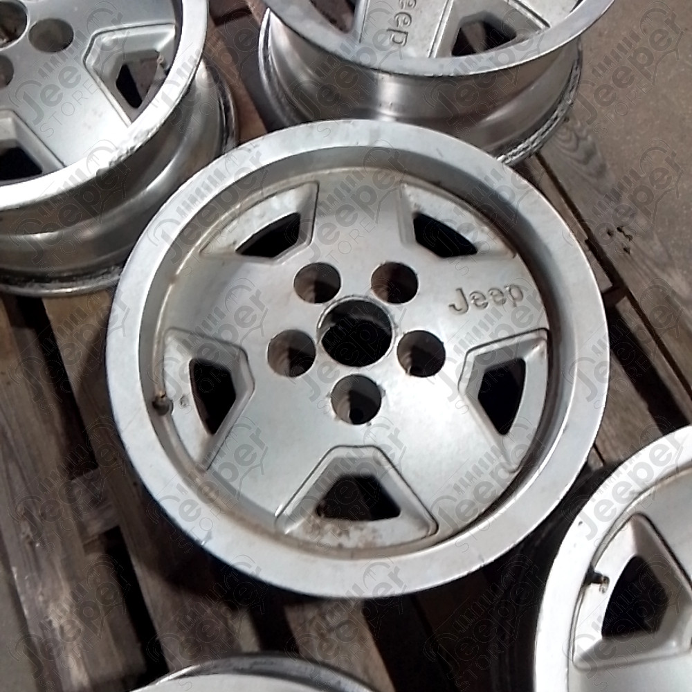 Occasion : Jante en aluminium d'origine 5x114.3 - 7x15 pour Jeep YJ, XJ, ZJ, ZG