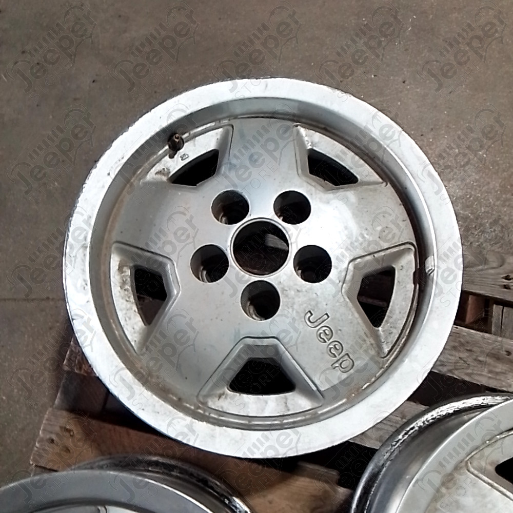 Occasion : Jante en aluminium d'origine 5x114.3 - 7x15 pour Jeep YJ, XJ, ZJ, ZG