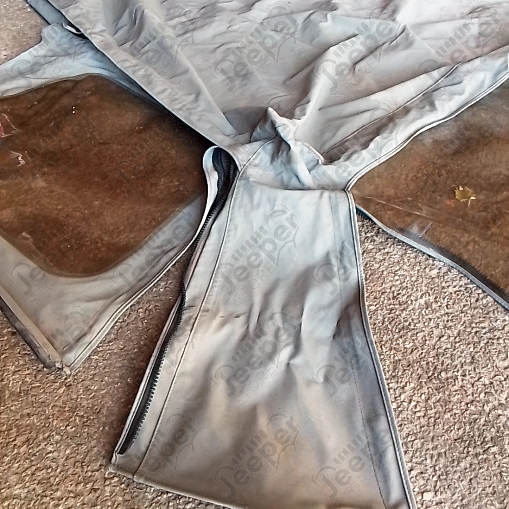 Occasion : Bâche Bestop grise avec fenêtres et lunette arrière plastique, incomplète sans aucune armature. pour Jeep CJ7, YJ