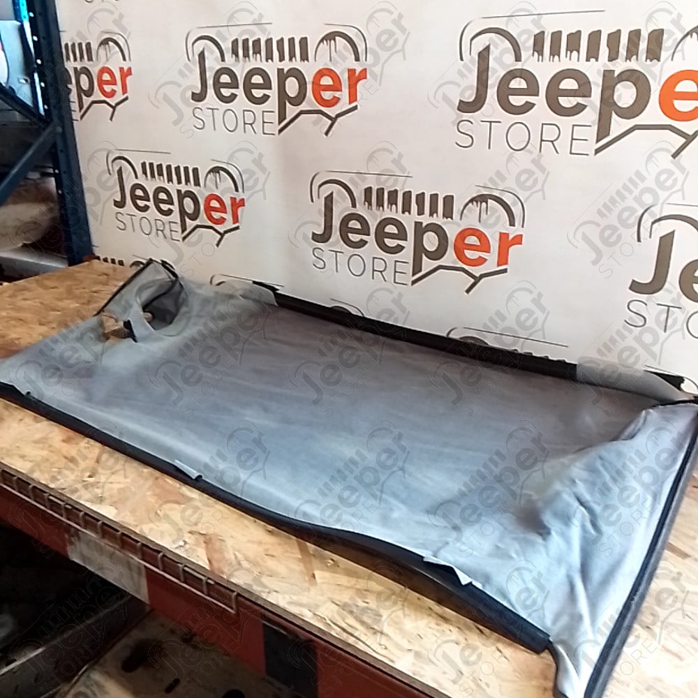 Occasion : Duster avec baguette coffre couvre plateau noir Bestop (déchirure) pour Jeep Wrangler YJ