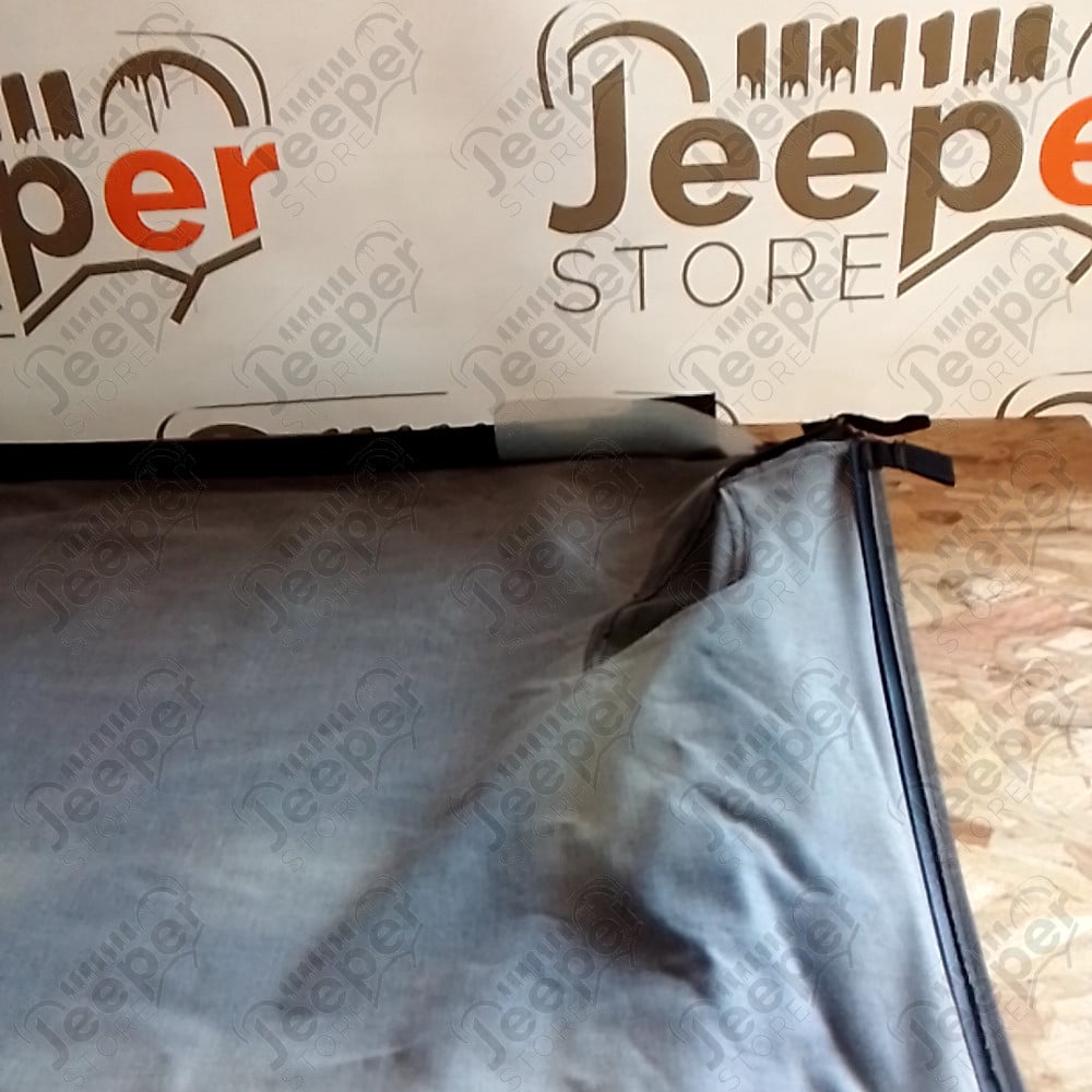Occasion : Duster avec baguette coffre couvre plateau noir Bestop (déchirure) pour Jeep Wrangler YJ
