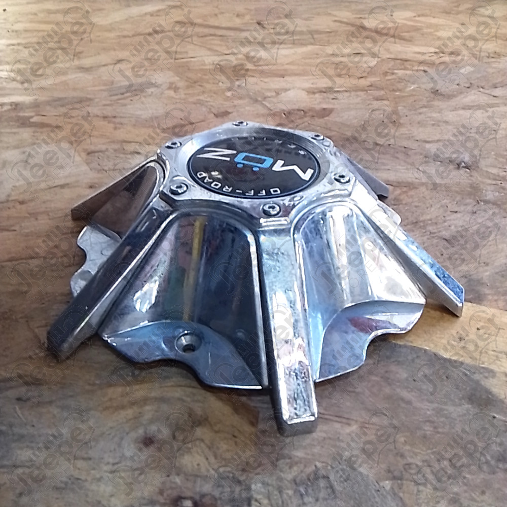 Occasion : Cache moyeu chromé en plastique MÖZ pour jante aluminium pour Jeep divers