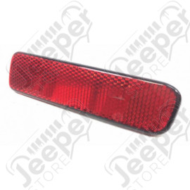 Catadioptre gauche sur pare chocs arrière Jeep Grand Cherokee WJ, WG