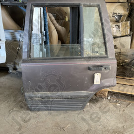Occasion : Porte arrière gauche grise pour Jeep Grand Cherokee ZJ, ZG (1992-1996)