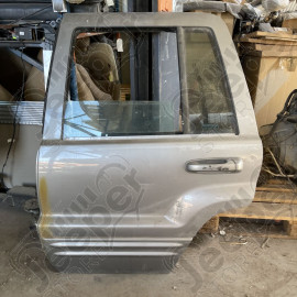 Occasion : Porte arrière gauche grise pour Jeep Grand Cherokee WJ, WG (1999-2004)