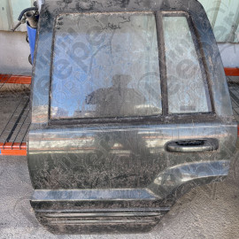 Occasion : Porte arrière gauche verte pour Jeep Grand Cherokee WJ, WG (1999-2004)