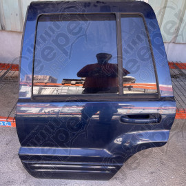 Occasion : Porte arrière gauche bleu pour Jeep Grand Cherokee WJ, WG (1999-2004)