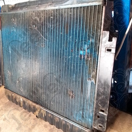 Occasion : Radiateur moteur avec sa buse d'air/ longueur fixation : 74 cm / hauteur : 14,5 cm / largeur : 62 cm pour Jeep divers