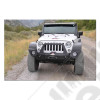 Rigid Series Full Front Bumper / COMPLETE with winch opening, integrated winch plate, Bull Bar, 6" light pockets, and recovery points. Powder coated textured black. 3/16" steel, Made in the USA The bumper comes with a 6" round light pocket. Most 6" roun