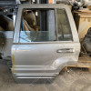 Occasion : Porte arrière gauche grise pour Jeep Grand Cherokee WJ, WG (1999-2004)