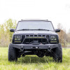 Pare chocs avant acier Rough Country (avec porte treuil) pour Jeep Cherokee XJ - RC10570