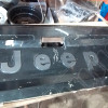 Occasion : Ridelle de hayon arrière avec logo Jeep pour Jeep Comanche MJ