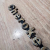 Occasion : Emblème logo "Cherokee" pour Jeep Cherokee XJ