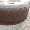 Occasion : Lot de 4 roues (jante d'origine) + 2 pneus VREDESTEIN et 2 pneus GENERAL en 235/60ZR16 pour Cadillac Seville STS 4.6L V8 - 32 soupapes - 4 portes - Boite automatique 4 rapports