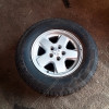 Occasion : Roue avec jante alu d'origine + pneu GOODYEAR Wrangler S4 en 235/70R16 pour Jeep TJ, XJ, ZJ, ZG