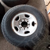 Occasion : Lot de 5 roues (jantes acier d'origine 8 trous) + pneus PATHFINDER Sport Sat en 265/75R16 + roue de secours pour Chevrolet Silverado 2500 HD 6.0L V8 Vortec - 2 portes